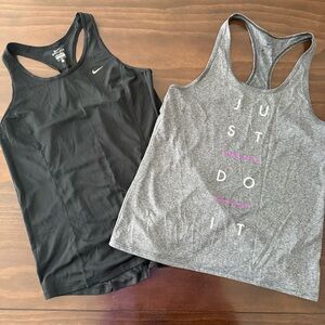 2 Nike Women's Racerback Tank Tops - Black is L and Gray M